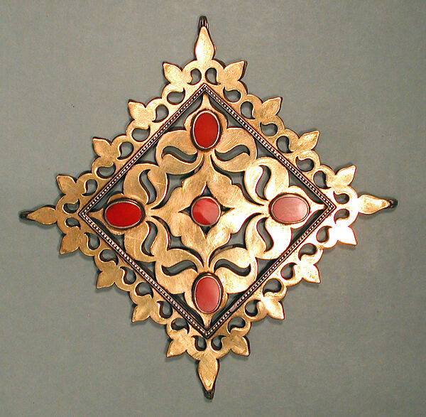 Pectoral Ornament, Silver, fire gilded, with decorative wire, openwork, stylized floral terminations, and table cut carnelians