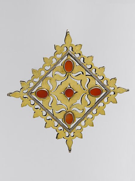 Pectoral Ornament, Silver, fire gilded, with decorative wire, openwork, stylized floral terminations, and table cut carnelians 