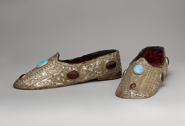 Slipper, One of a Pair, Silver with applied decoration, twisted silver wire, silver stamped beading, and slightly domed turquoises and carnelians and turquoise beads lined with red cotton fabric 