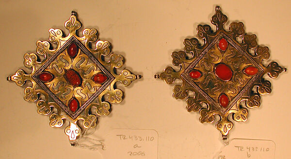 Lozenge-Shaped Pectoral Ornament, One of a Pair, Silver, fire gilded, with decorative wire, and table cut and cabochon carnelians