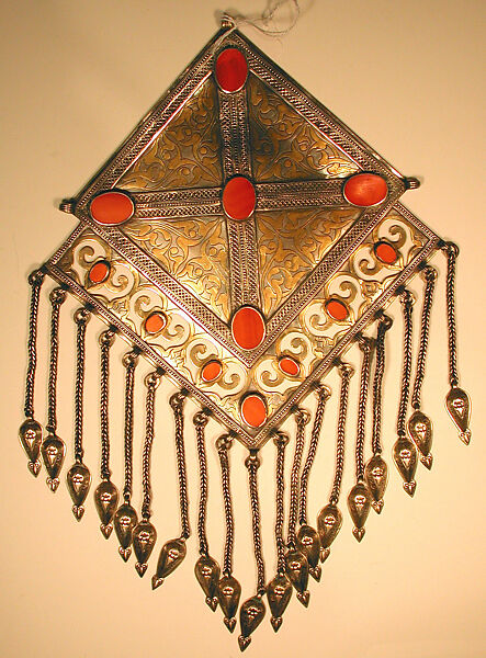 Pectoral Ornament, One of a Pair, Silver; fire gilded and chased, with decorative wire, openwork, wire chains and embossed pendants, and table cut carnelians