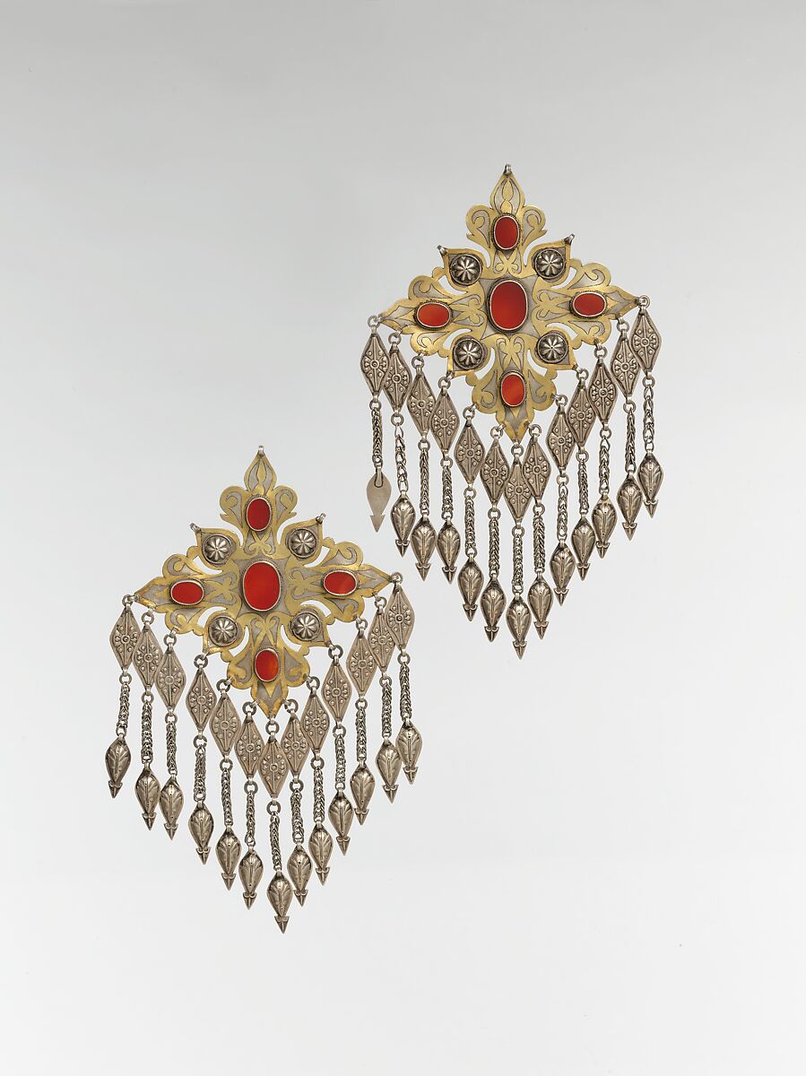 Teke Floral Pectoral Ornament, One of a Pair, Silver, fire-gilded and chased, with applied decoration, openwork, wire chains, pendants with applied decoration, and table-cut carnelians