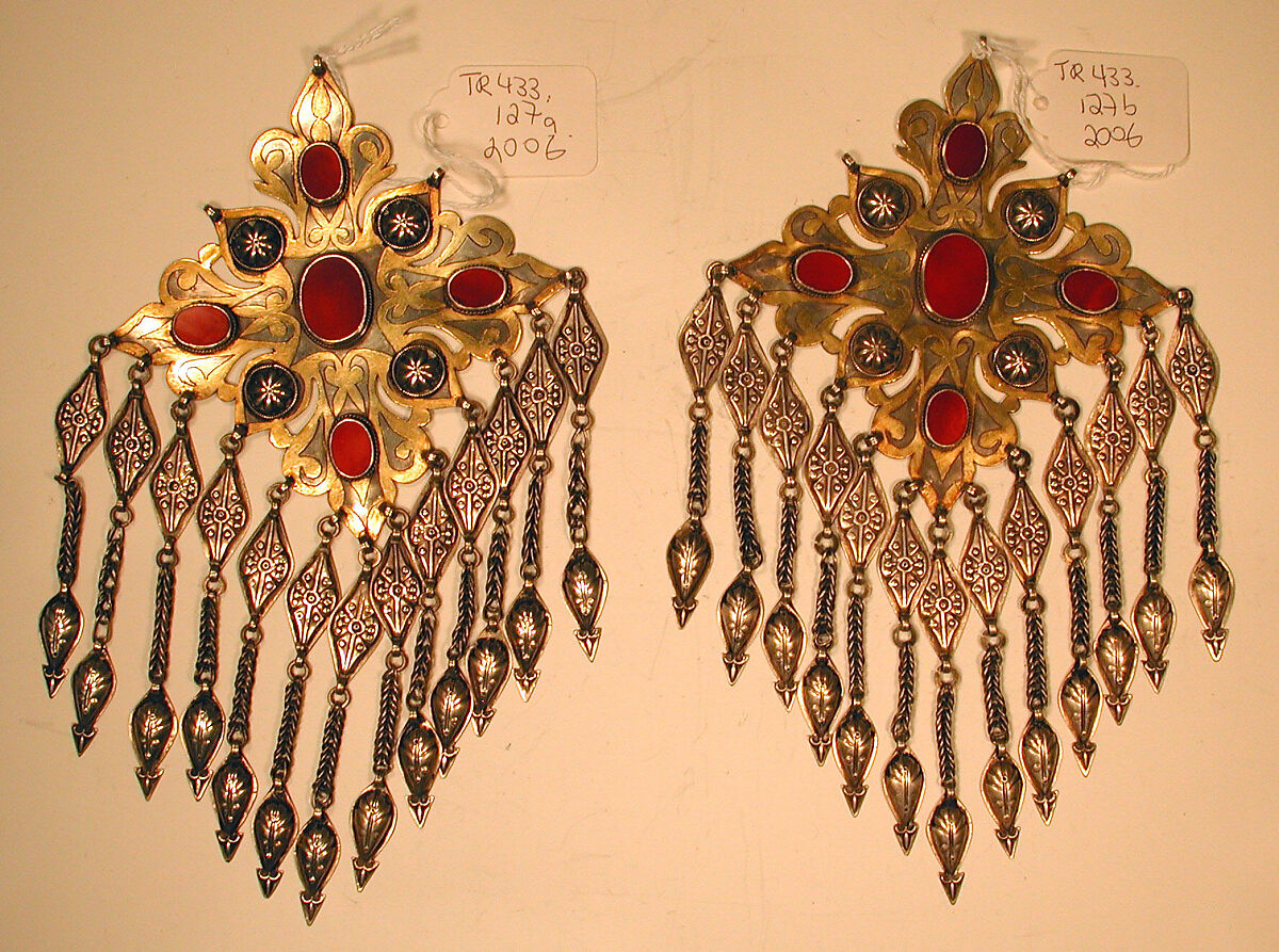 Teke Floral Pectoral Ornament, One of a Pair, Silver, fire-gilded and chased, with applied decoration, openwork, wire chains, pendants with applied decoration, and table-cut carnelians