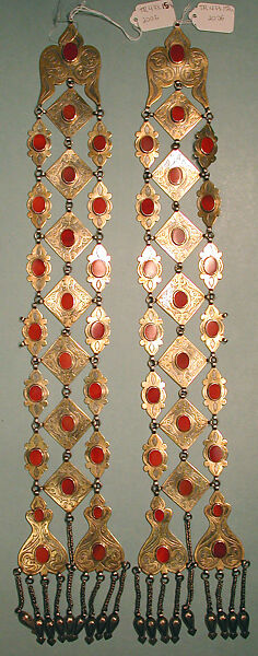 Dorsal Plait Ornament, One of a Pair, Silver, fire-gilded  and chased, with wire chains, embossed pendants, and table-cut carnelians; probably missing connecting chain