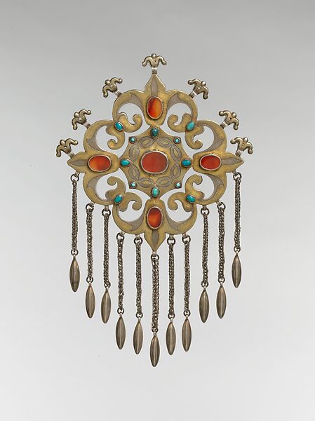 Floral Pectoral Ornament, Silver, fire-gilded and chased, with ram's-head upper terminals, openwork, wire chains, embossed pendants, table-cut carnelians, and turquoise beads 