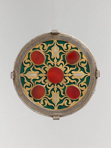 Pectoral Disc Ornament, Silver; fire gilded and chased, with openwork, decorative wire, and table cut carnelians, backed with green felt 