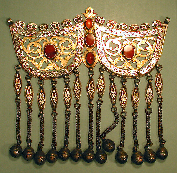 Pectoral Ornament, Silver; fire-gilded and chased, with openwork, applied decoration, wire chains, bells, ram's-head terminals, and table cut and cabochon carnelians