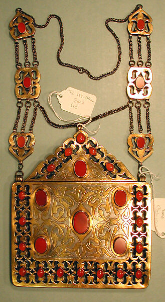 Amulet Holder, Silver; fire gilded with openwork and engraving/punching decoration and table cut carnelians and twisted silver wire chains