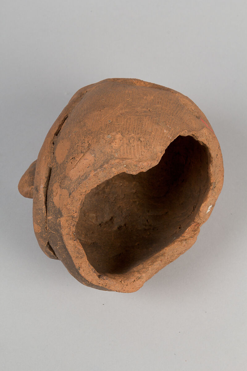 Head of a Masked Clay Tomb Sculpture (Haniwa), Earthenware, Japan