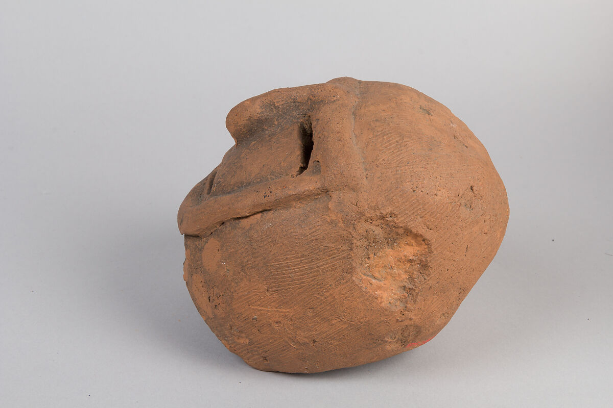 Head of a Masked Clay Tomb Sculpture (Haniwa), Earthenware, Japan