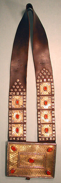 Amulet Holder, Silver; fire-gilded and chased, with applied decoration, silver beads,and table-cut carnelians; mounted on leather