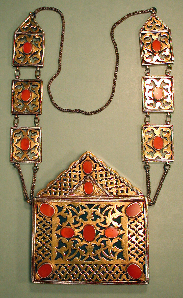 Qur'an Holder, Silver, fire gilded with openwork and stamped decoration, silver beads and table cut carnelians
