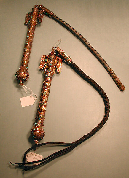 Whip, One of a Pair, Silver, fire-gilded with horse head terminals, stamped beading, silver shot, twisted wire, cabochon turquoises, and glass beads, with a waxed fabric attachment (a), leather attachment (b)