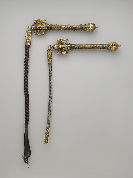 Whip, One of a Pair, Silver; fire-gilded with horse head terminals, stamped beading, silver shot and twisted wire, cabochon turquoises and glass beads, with a leather attachment