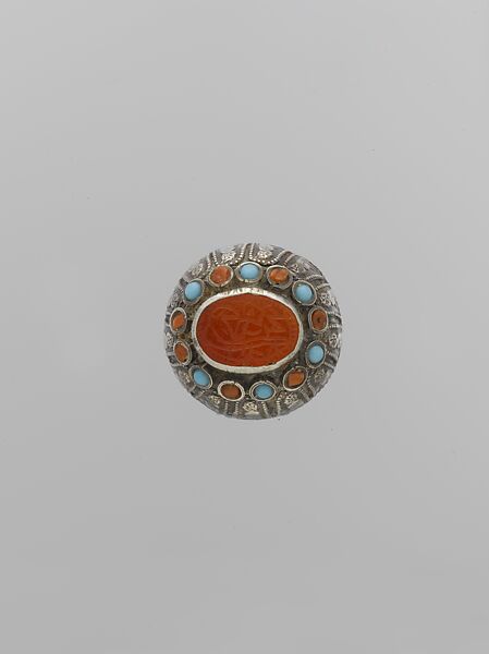 Seal Ring, Silver, with decorative wire, stamped beading, glass and turquoise beads, and incised table-cut carnelian 