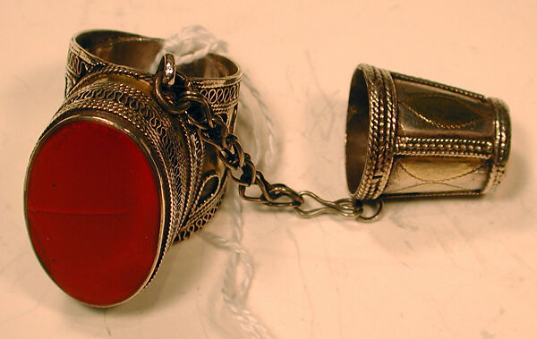 Ring and Thimble, Silver; fire-gilded and chased, with decorative wire, table-cut carnelian, loop-in-loop chain, and attached thimble