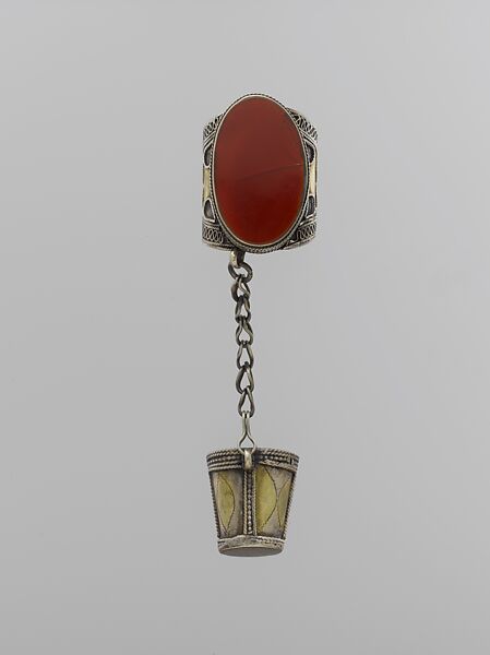 Ring and Thimble, Silver, fire-gilded and chased, with decorative wire, table-cut carnelian, loop-in-loop chain, and attached thimble 