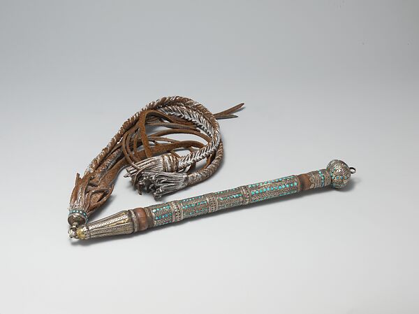 Royal Whip and Goad, Silver; fire-gilded with applied decoration, decorative wire, and, turquoise beads on a wood base with leather extensions 