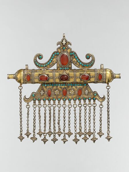 Triangular Amulet Holder, Silver; fire-gilded, with stamped beading, silver shot, decorative wire, gilt and silver applied decoration, loop-in-loop chains, cone-shaped pendants, slightly domed and cabochon carnelians, and turquoise beads 
