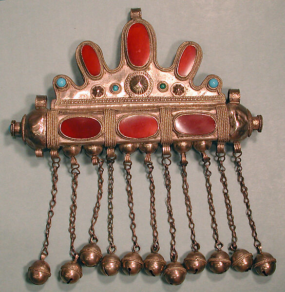 Triangular Amulet Holder, Silver with silver twisted wire and applied decoration, slightly domed table cut carnelians and turquoise beads, silver link chains and spherical bells/beads.