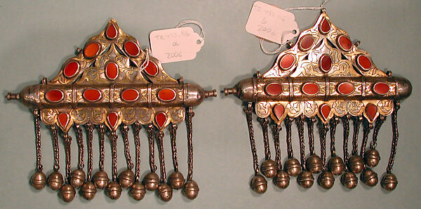 Triangular Amulet Holder, One of a Pair, Silver; fire gilded and chased,  table cut carnelians, silver link chains and bells