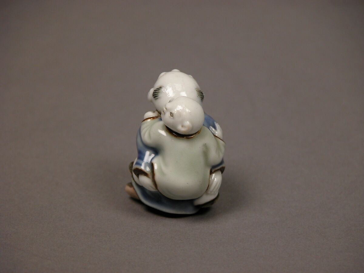 Child Carrying an Infant Netsuke, Porcelain with underglaze blue and overglaze enamels (Hirado ware), Japan