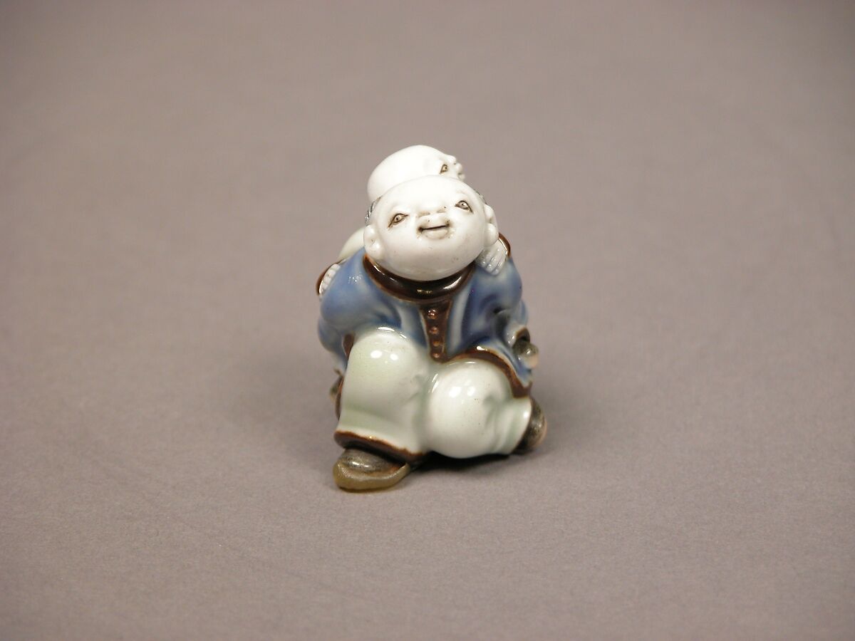 Child Carrying an Infant Netsuke, Porcelain with underglaze blue and overglaze enamels (Hirado ware), Japan