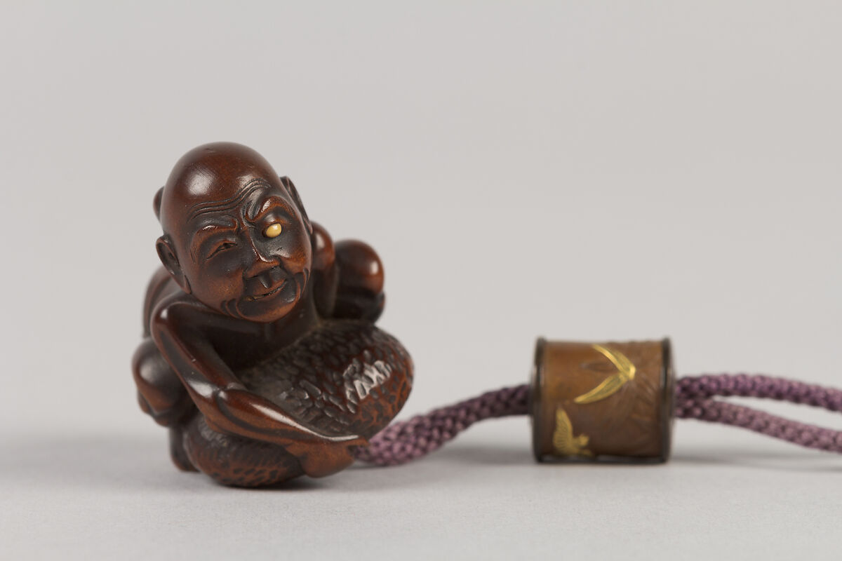 Case (Inrō) with Design of Seated Courtier Drinking Sake and a Young Woman with Maple Leaves, Kajikawa Katsuhira, Nashiji (pear-skin) lacquer decorated with togidashi sprinkled and polished lacquer and metal inlay; Ojime: metal drum inlaid with gold; Netsuke: carved wood figure, Japan