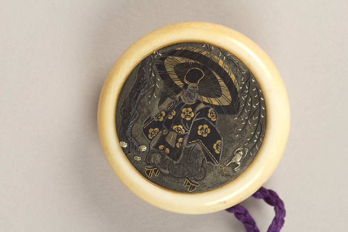 Inrō with Prince Yamato Takeru Disguised as a Woman, Bairin (lacquerwork), Five cases; lacquered wood with gold, silver takamaki-e, hiramaki-e, and cut-out gold foil application on gold ground
Netsuke: kagamibuta type, Ono no Tōfū; ivory and metal
Ojime: red coral bead, Japan