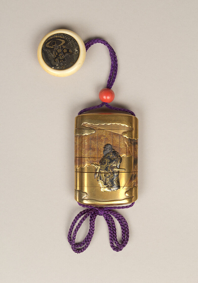 Inrō with Prince Yamato Takeru Disguised as a Woman, Bairin (lacquerwork), Five cases; lacquered wood with gold, silver takamaki-e, hiramaki-e, and cut-out gold foil application on gold ground
Netsuke: kagamibuta type, Ono no Tōfū; ivory and metal
Ojime: red coral bead, Japan