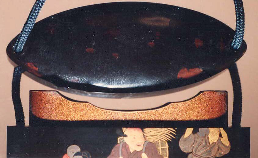 Inrō with Street Festival (obverse); People Watching a Puppet Show (reverse), Tatsuke Takamasu (Japanese, active second half of the 18th century), Three cases; lacquered wood with gold, silver, and color (iroko) togidashimaki-e on black lacquer groundNetsuke: carved teakwood; peach with a monkey inside (signed: Kagetoshi)Ojime: carved teakwood with floral design, Japan