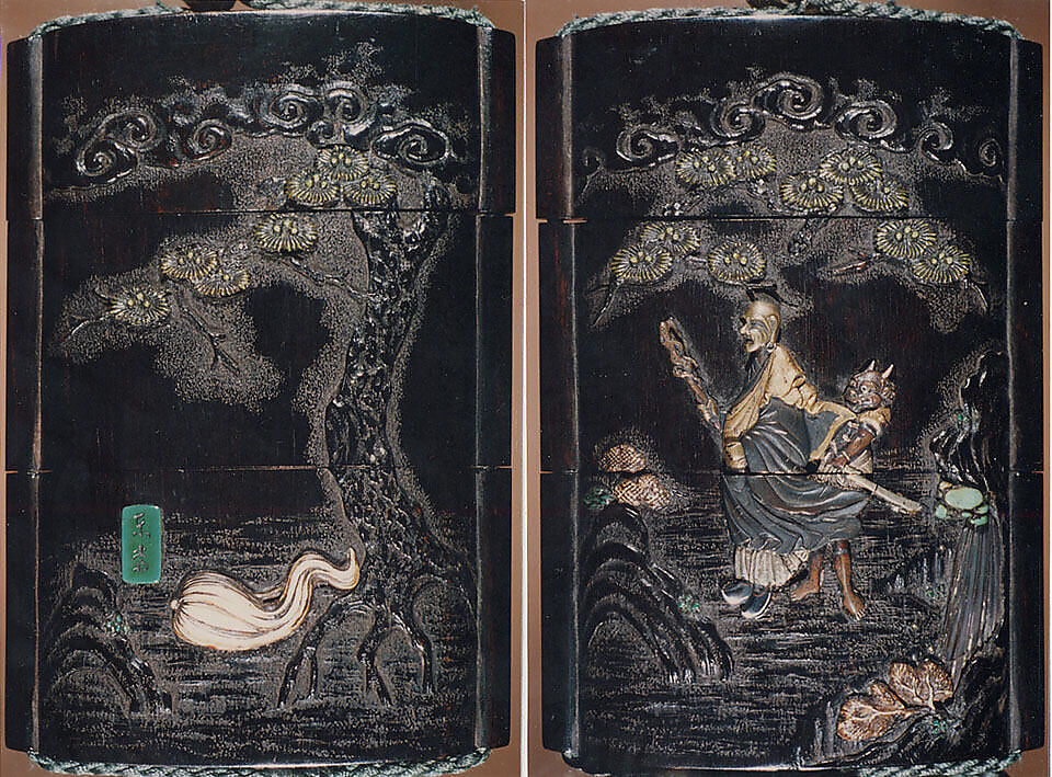 Case (Inrō) with Design of Ōni (Demon) Standing Behind Cloak of Arhat (obverse); Fly Whisk (Hossu) beneath Pine Tree (reverse), Tokoku, Wood ebony, carved relief with inlay of ivory, metal and malachite; Interior: plain;  Netsuke: Jurojin on crane; Ojime: Child climbing rope, Japan