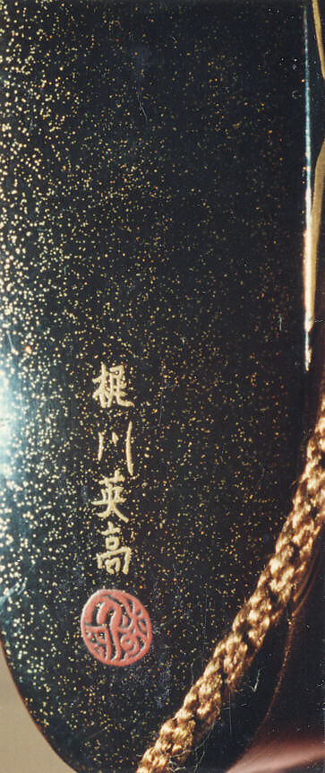 Case (Inrō) with Design of Courtier Cleaning Another's Ear (obverse); Courtier Laughing (reverse), Kajikawa Hidetaka, Lacquer, roiro, gold, brown and red togidashi, nashiji; Netsuke: fukurokuju
Interior: nashiji and fundame, Japan