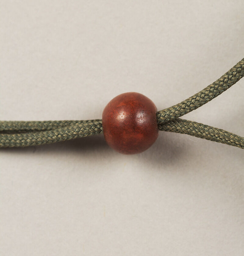 Inrō with the Noh Play Dōjōji (obverse) and Flowering Cherry Tree (reverse), Four cases; lacquered wood with gold, silver, color hiramaki-e, togidashimaki-e on gold ground
Netsuke: treasure ship with seven gods of good fortune; ivory
Ojime: wood bead, Japan