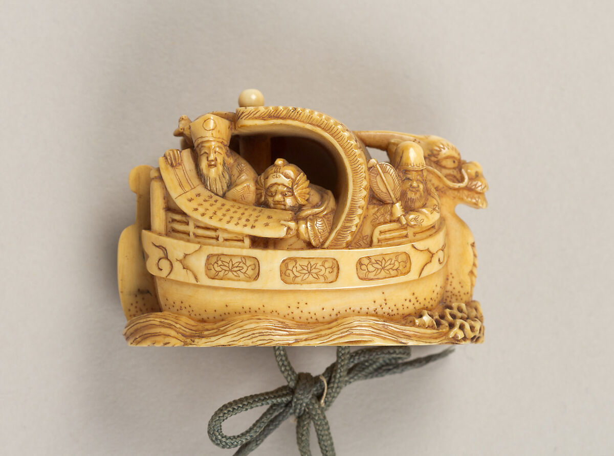 Inrō with the Noh Play Dōjōji (obverse) and Flowering Cherry Tree (reverse), Four cases; lacquered wood with gold, silver, color hiramaki-e, togidashimaki-e on gold ground
Netsuke: treasure ship with seven gods of good fortune; ivory
Ojime: wood bead, Japan