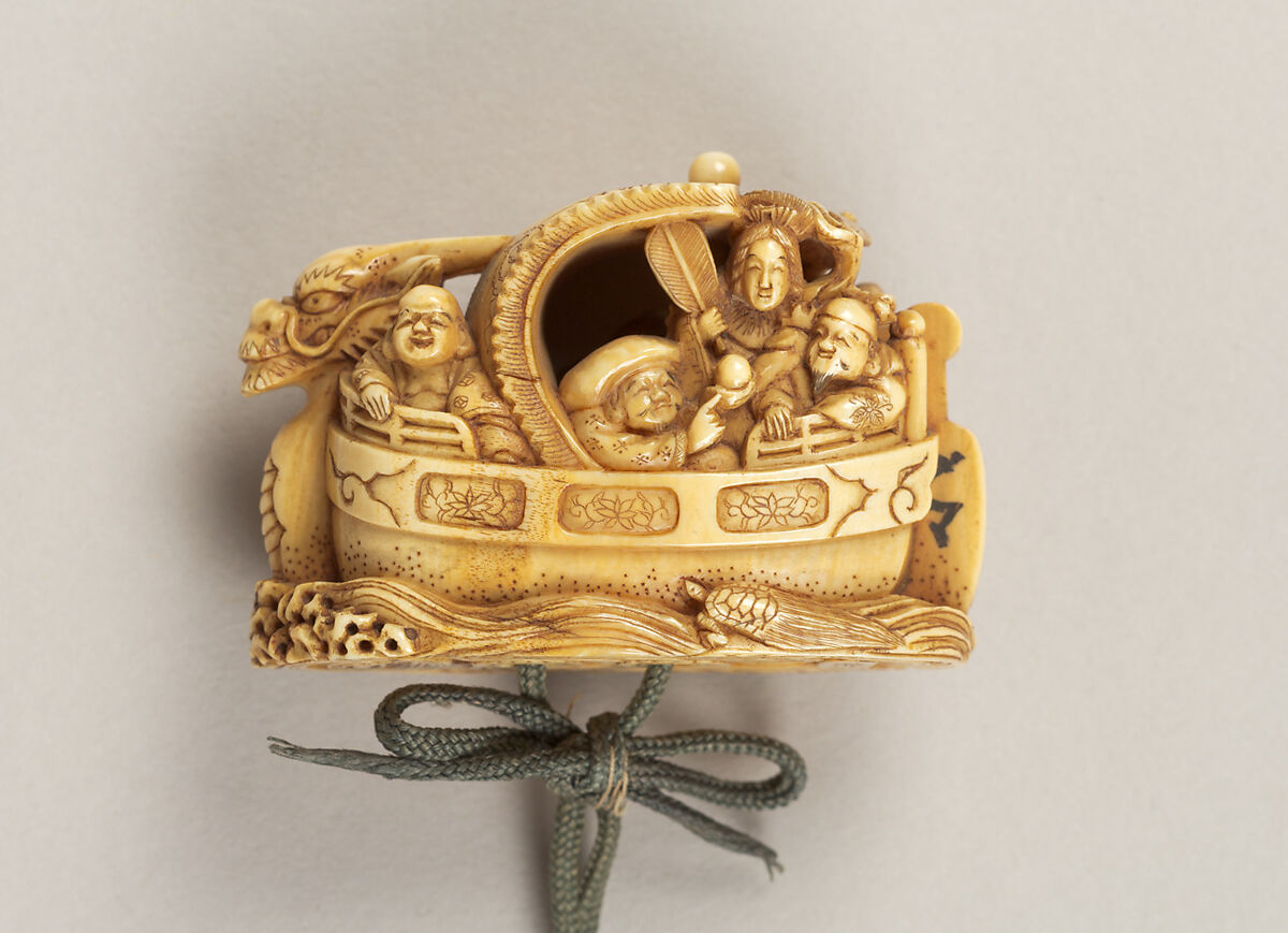 Inrō with the Noh Play Dōjōji (obverse) and Flowering Cherry Tree (reverse), Four cases; lacquered wood with gold, silver, color hiramaki-e, togidashimaki-e on gold ground
Netsuke: treasure ship with seven gods of good fortune; ivory
Ojime: wood bead, Japan