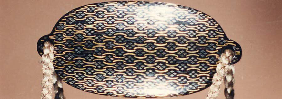 Inrō with God of Longevity (Jurōjin) and a Stag (obverse) and Long-Tailed Turtle (Minogame) under Bamboo (reverse), Somada School Artist (Japanese), Four cases; lacquered wood with gold hiramaki-e, togidashimaki-e, nashiji (“pear-skin ground”), gold foil cutouts, and mother-of-pearl inlay on black lacquer ground Netsuke: manju type, basket with chrysanthemums; lacquered wood with mother-of-pearl inlay Ojime: carved red lacquer bead, Japan