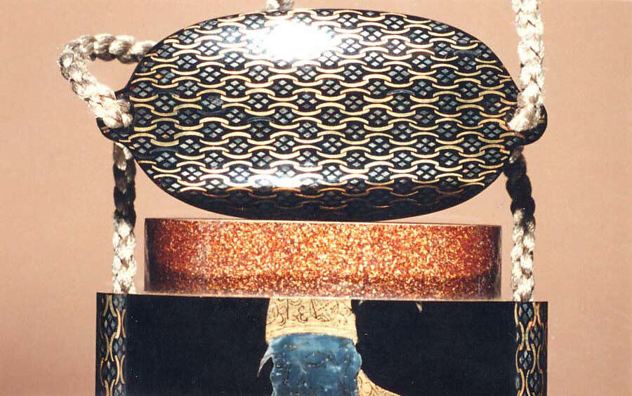 Inrō with God of Longevity (Jurōjin) and a Stag (obverse) and Long-Tailed Turtle (Minogame) under Bamboo (reverse), Somada School Artist (Japanese), Four cases; lacquered wood with gold hiramaki-e, togidashimaki-e, nashiji (“pear-skin ground”), gold foil cutouts, and mother-of-pearl inlay on black lacquer ground Netsuke: manju type, basket with chrysanthemums; lacquered wood with mother-of-pearl inlay Ojime: carved red lacquer bead, Japan