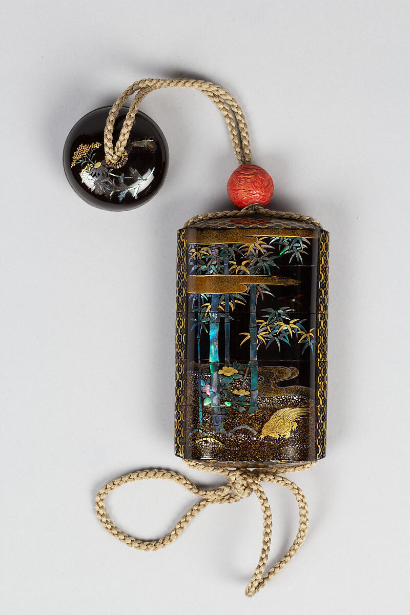 Inrō with God of Longevity (Jurōjin) and a Stag (obverse) and Long-Tailed Turtle (Minogame) under Bamboo (reverse), Somada School Artist (Japanese), Four cases; lacquered wood with gold hiramaki-e, togidashimaki-e, nashiji (“pear-skin ground”), gold foil cutouts, and mother-of-pearl inlay on black lacquer ground Netsuke: manju type, basket with chrysanthemums; lacquered wood with mother-of-pearl inlay Ojime: carved red lacquer bead, Japan