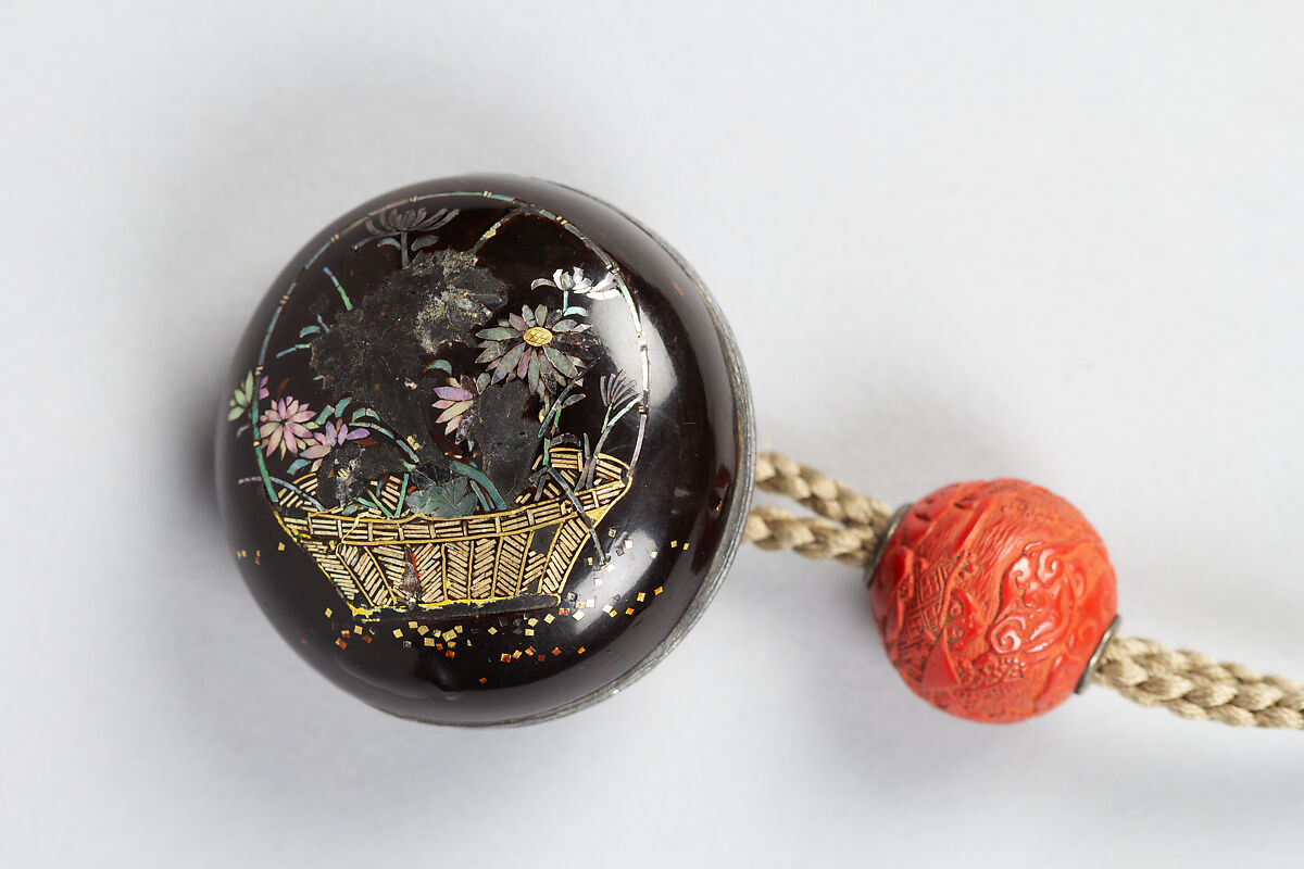 Inrō with God of Longevity (Jurōjin) and a Stag (obverse) and Long-Tailed Turtle (Minogame) under Bamboo (reverse), Somada School Artist (Japanese), Four cases; lacquered wood with gold hiramaki-e, togidashimaki-e, nashiji (“pear-skin ground”), gold foil cutouts, and mother-of-pearl inlay on black lacquer ground Netsuke: manju type, basket with chrysanthemums; lacquered wood with mother-of-pearl inlay Ojime: carved red lacquer bead, Japan