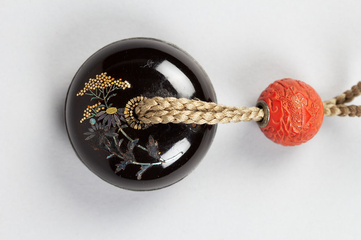 Inrō with God of Longevity (Jurōjin) and a Stag (obverse) and Long-Tailed Turtle (Minogame) under Bamboo (reverse), Somada School Artist (Japanese), Four cases; lacquered wood with gold hiramaki-e, togidashimaki-e, nashiji (“pear-skin ground”), gold foil cutouts, and mother-of-pearl inlay on black lacquer ground Netsuke: manju type, basket with chrysanthemums; lacquered wood with mother-of-pearl inlay Ojime: carved red lacquer bead, Japan