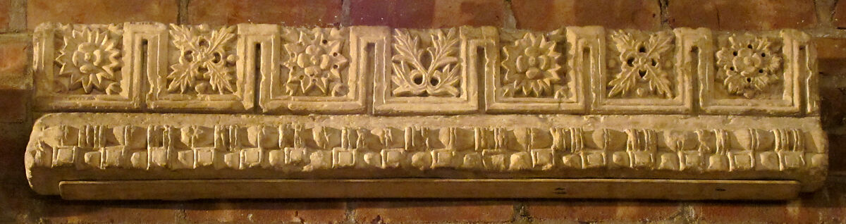 Fragment from a Molding with Rosettes and Acanthus Clusters, Limestone; carved in relief 