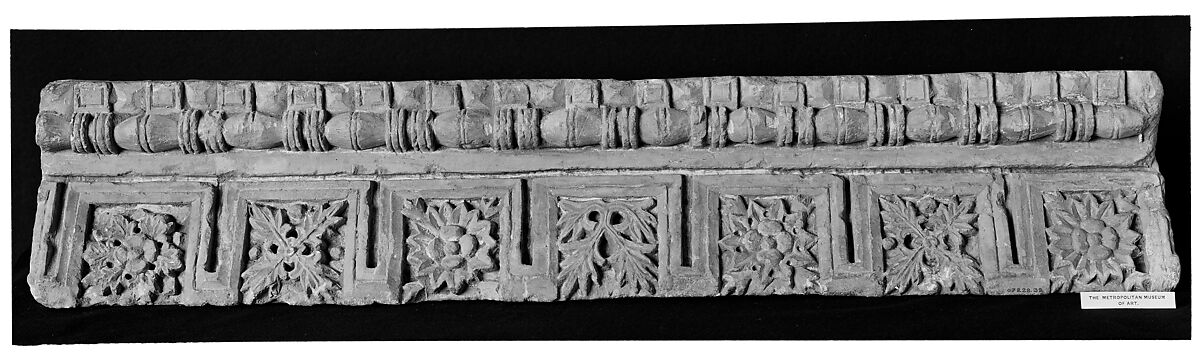 Fragment from a Molding with Rosettes and Acanthus Clusters, Limestone; carved in relief