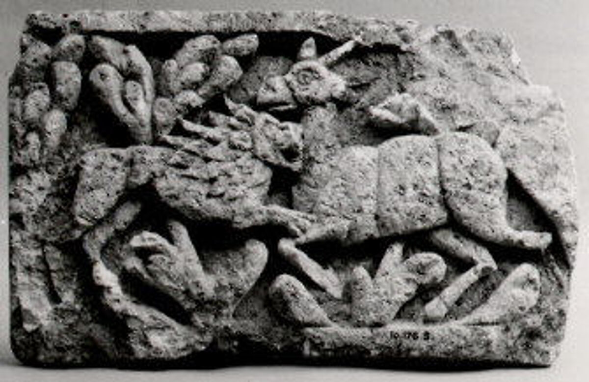 Limestone Fragment from a Frieze with a Lion Attacking an Ibex, Limestone; carved in relief