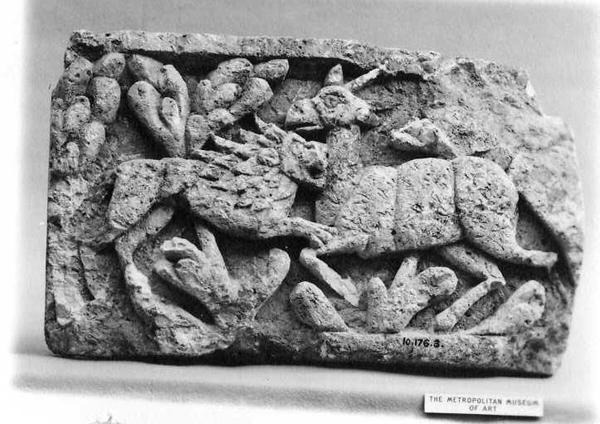 Limestone Fragment from a Frieze with a Lion Attacking an Ibex, Limestone; carved in relief 