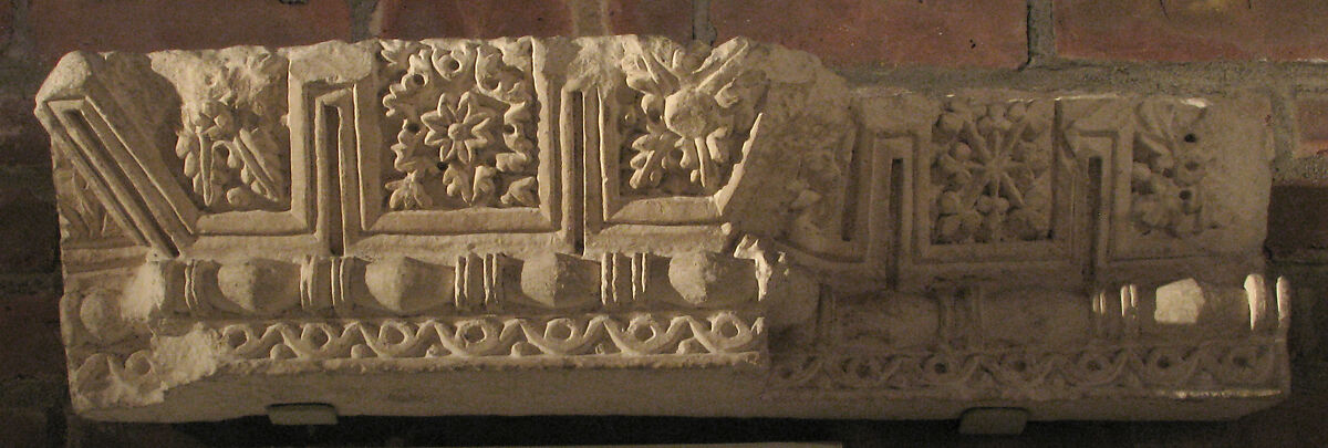 Fragment from a Molding with Rosettes and Acanthus Clusters, Limestone; carved in relief