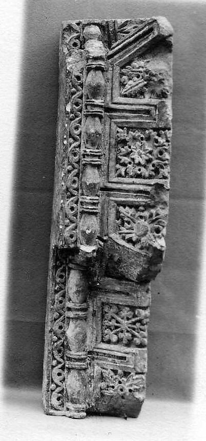 Fragment from a Molding with Rosettes and Acanthus Clusters, Limestone; carved in relief 