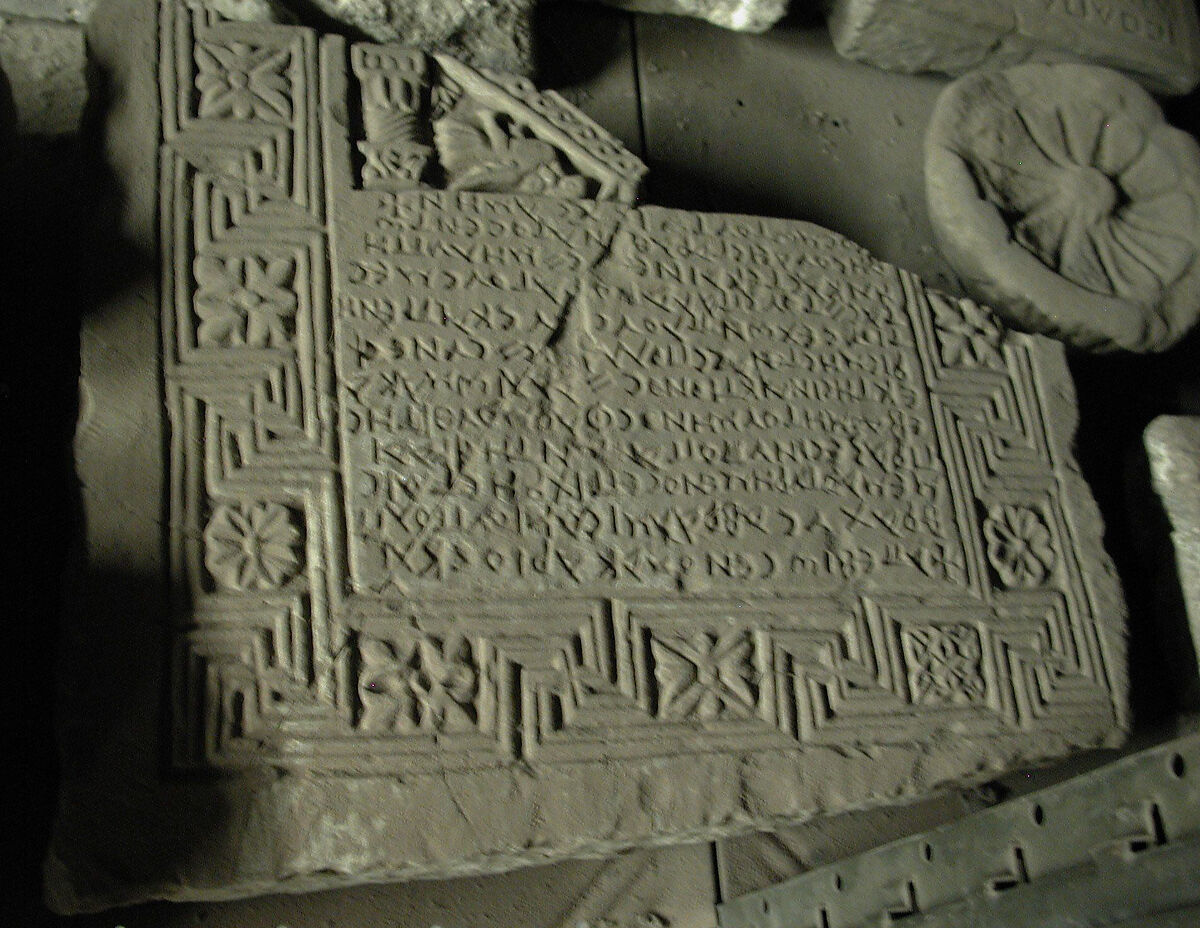Fragment of an Inscribed Stele Enclosed in a Frame with Swastikas and Rosettes; Part of a Gable with Bird and  a Pilaster., Limestone; incised and carved in relief 