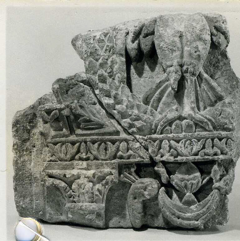 Fragment from a Two-Sided Sanctuary Screen with Birds Eating Grapes, Limestone, red pigment; carved in relief