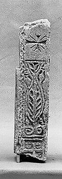 Fragment of a Doorpost with a Cross, Limestone; carved in relief 